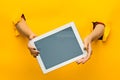 Female teen hands using tablet pc with black screen, isolated Royalty Free Stock Photo