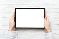 Female teen hands using tablet pc with white screen, mockup image of woman hand holding white tablet pc with blank white Royalty Free Stock Photo