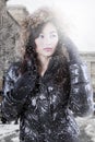 Female teenage model with winter jacket in the city Royalty Free Stock Photo