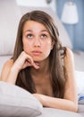 Female teenager is feeling distressed and lonely alone