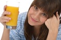 Female teenager with healthy orange juice