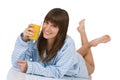 Female teenager with healthy orange juice