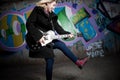 Female teenager playing guitar Royalty Free Stock Photo