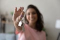 Female tenant show keys moving to new home Royalty Free Stock Photo
