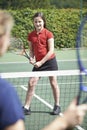 Female Tennis Coach Giving Lesson To Girl Royalty Free Stock Photo