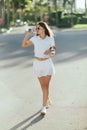 female tennis player drinking water, young Royalty Free Stock Photo