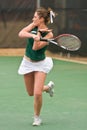 Female Tennis Player Follows Through On Forehand Royalty Free Stock Photo