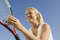 Female Tennis Player Preparing to Serve low angle view close up