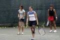 Female tennis players laughing