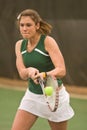 Female Tennis Players Smacks Backhand In Match Royalty Free Stock Photo