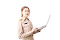 Female Thai government officer in khaki uniforms working on computer on over isolated white background. Young Asian woman using Royalty Free Stock Photo