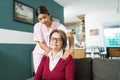 Nurse Taking Care Of Senior Patient At Home