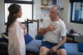 Female therapist talking with senior male patient Royalty Free Stock Photo