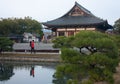 A female tourist with a backpack in the Toji Temple area in Kyoto in Japan in early spring