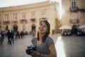 Female tourist backpacker visiting Italy.Woman in Syracuse,Sicily.Old town of Syracuse, Ortigia island visitor.Travel destination