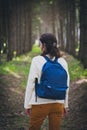 Female tourist with blue backpack Royalty Free Stock Photo