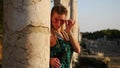 Female tourist in colonnaded street in Side, Turkey