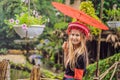 A female tourist dressed in the traditional dress of the inhabitants of the Vietnamese mountains, the Hmong. Woman in