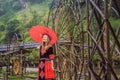 A female tourist dressed in the traditional dress of the inhabitants of the Vietnamese mountains, the Hmong. Woman in