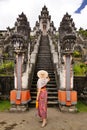 Female tourist with hat at Lempuyang temple