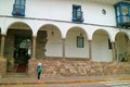 Female Tourist in Looking at the Facade of Museo Historico Regional or Cusco Regional History Museum, Cusco, Peru