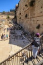 Female tourist overlooks Herodian Street in Old City Jerusalem