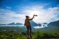 Female tourist photographers travel on the mountain. Landscape Beautiful Mountain on sea at Samet Nangshe Viewpoint. Phang Nga Bay Royalty Free Stock Photo