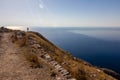 Female tourist taking snapshots, Santorini, Greece