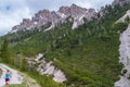 Female trailrunning in the mountains of dolomites Val Gardena, Italy