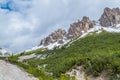 Female trailrunning in the mountains of dolomites Val Gardena, Italy