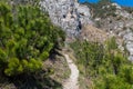 Female trailrunning in mountains at Lake Garda, Italy