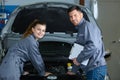 female trainee mechanic at work with supervisor Royalty Free Stock Photo