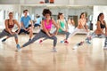 Female trainer doing exercises with fitness group Royalty Free Stock Photo