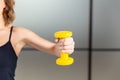 Female training with dumbbell isoolated. Royalty Free Stock Photo