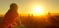 Female traveler relax temples at Bagan Myanmar Asia at sunset