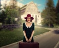 Female traveler in retro hat and dress