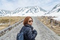 Female traveler and snow mountain at japan alps tateyama kurobe alpine