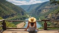 Female traveler in Straw Hat, Reveling in the Majestic River Canyon. Generative AI