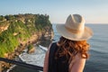 Female Traveler at Uluwatu Temple in Bali, Indonesia Royalty Free Stock Photo