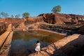 Female traveler at Sigiriya rock in Sri Lanka Royalty Free Stock Photo