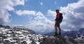 Female trekker standing on the rock with beautiful landscape background