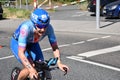 Female triathlete riding her bike