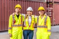 Female worker and two male workers wearing yellow safety vests. Royalty Free Stock Photo