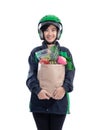 Female uber delivery wearing helmet bring groceries