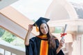 Female university graduates celebrate happily after completed and received diploma degree. The female graduates express congratula Royalty Free Stock Photo
