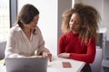 Female University Student Working One To One With Tutor