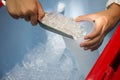 Female use metal ice scoop and plastic cup in ice bucket Royalty Free Stock Photo