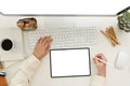 A female using tablet, designing her artwork on tablet, working in her modern white office desk Royalty Free Stock Photo