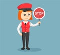 Female valet service standing with stop sign Royalty Free Stock Photo