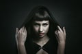 Female vampire with beautiful eyes Royalty Free Stock Photo